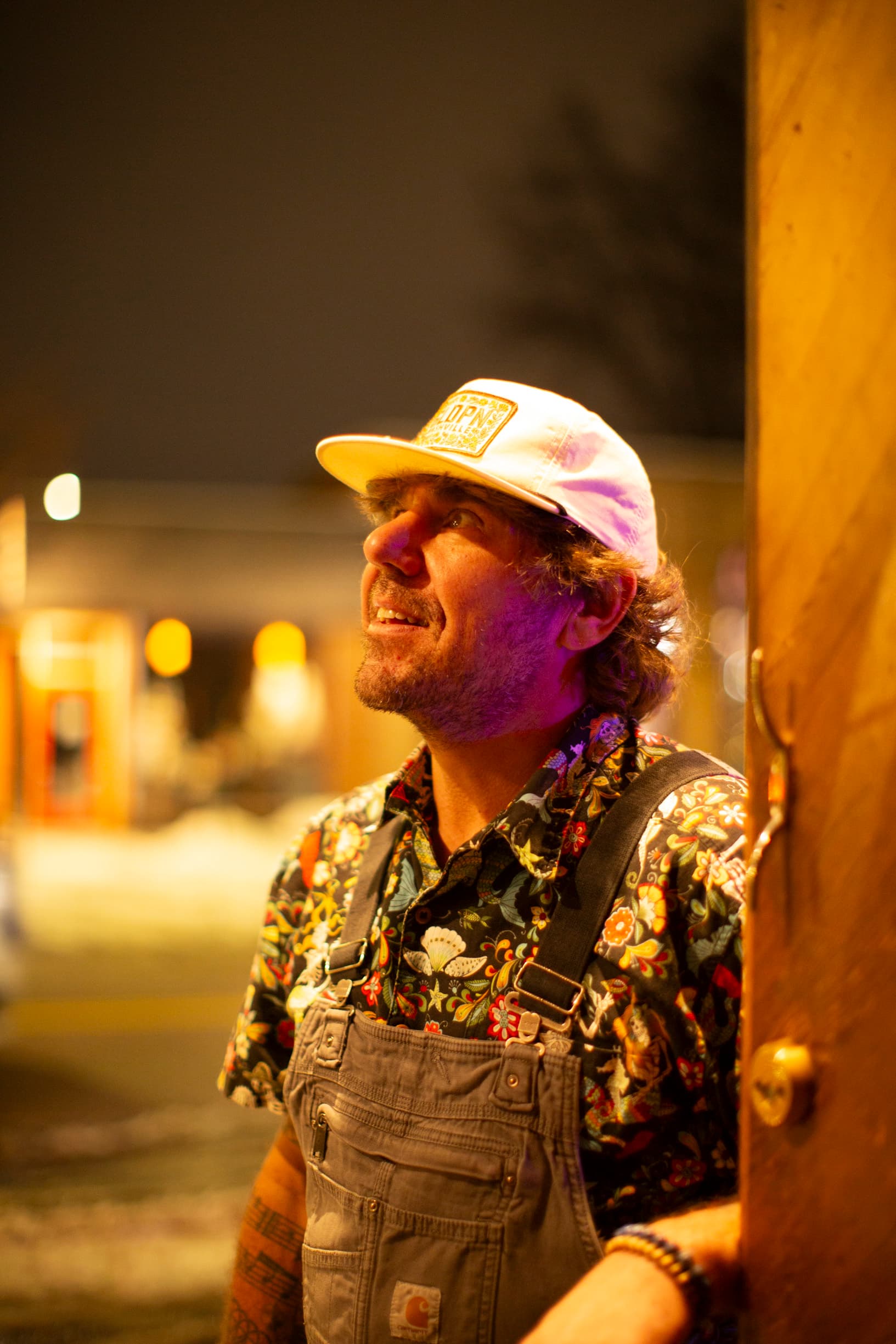 Ty Stonehawker portrait outdoors at night, looking up